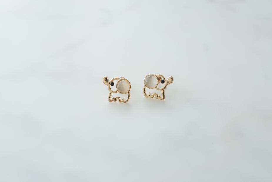 Gold Elephant Earrings by dav store