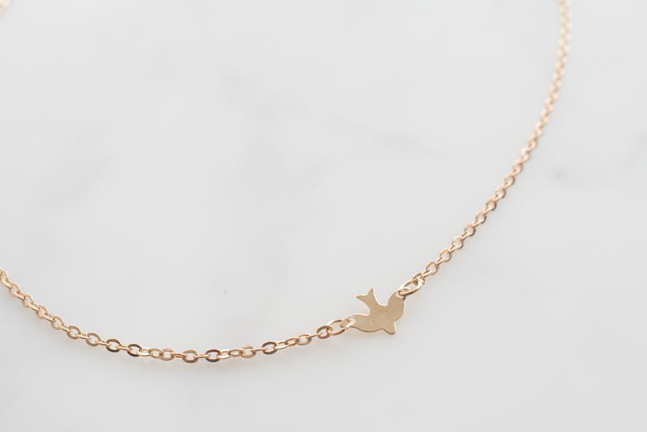 Gold Bird Necklace by dav store